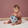 Bola de tela sensorial con anillas